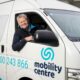 Image of a Mobility Centre staff member driving a Mobility Centre van